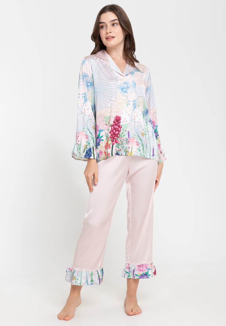 A woman wearing a Silk long sleeves Pajama Set