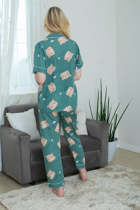 A woman wearing a cotton short sleeve pajama set