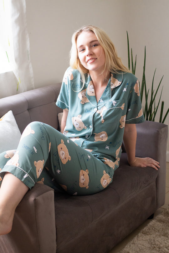 A woman wearing a cotton short sleeve pajama set