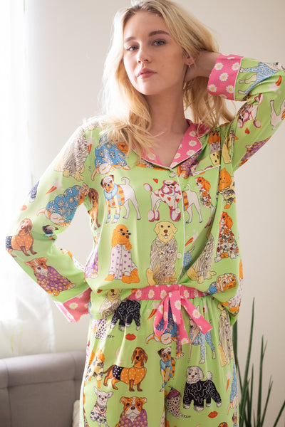 A woman standing and wearing silk long sleeve pajama set