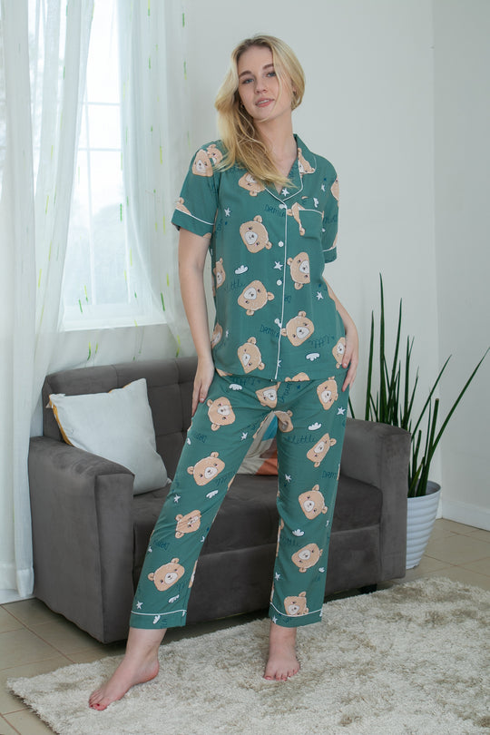 A woman wearing a cotton short sleeve pajama set