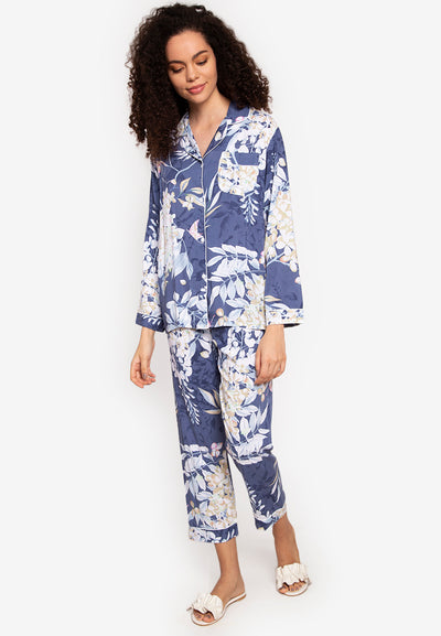 A woman wearing a cotton long sleeve pajama set