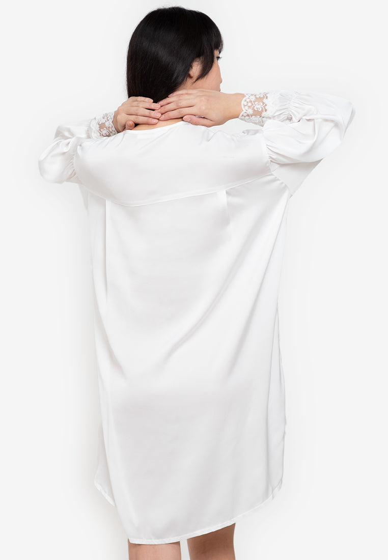 A woman wearing a silk dress