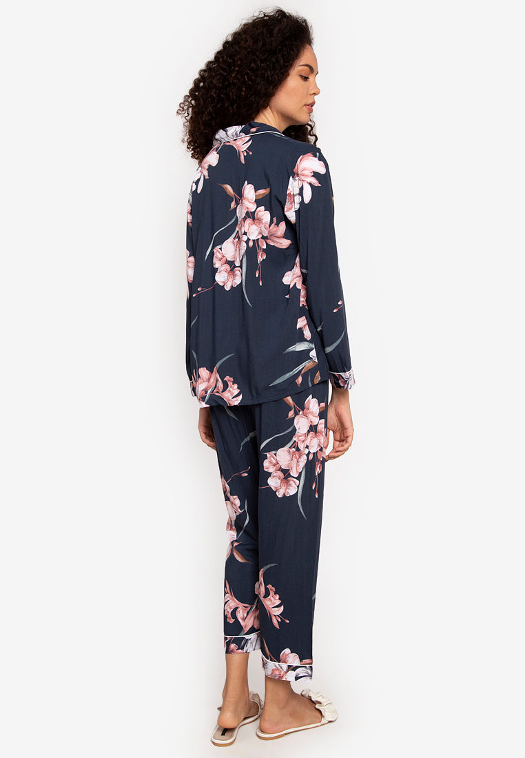 A woman wearing a cotton long sleeve pajama set