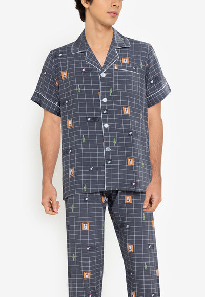 A man wearing a cotton short sleeve pajama set