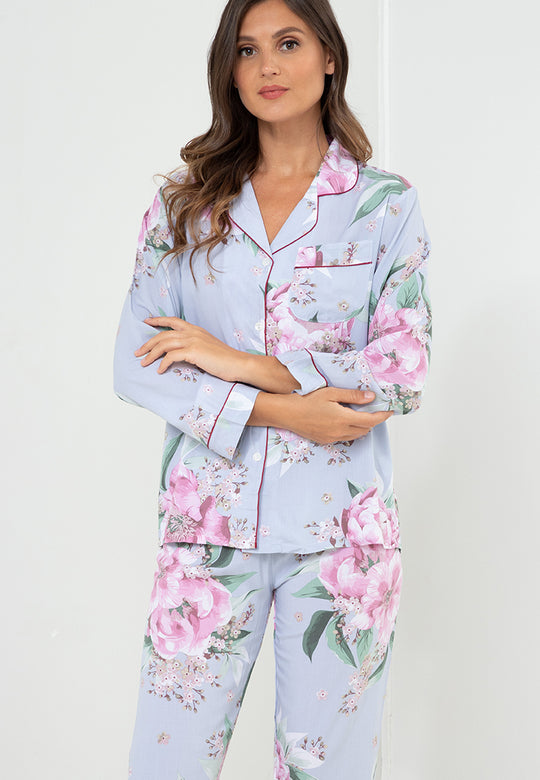 A woman standing and wearing cotton long sleeve pajama