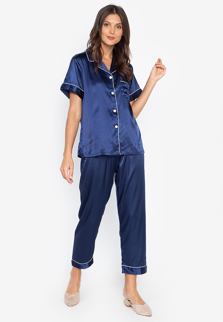 A woman wearing a Silk short sleeves Pajama Set