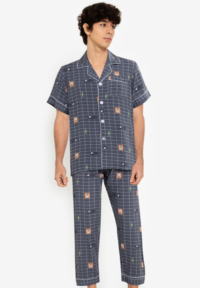 A man wearing a cotton short sleeve pajama set