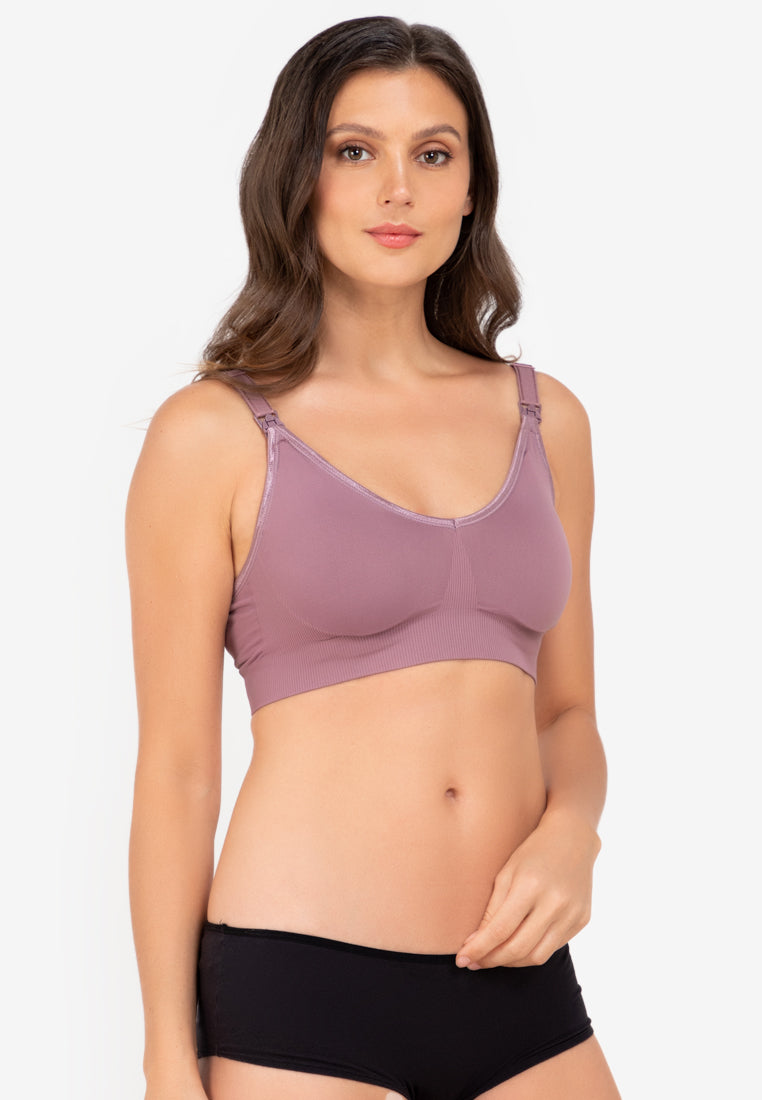 A woman wearing a nursing bra