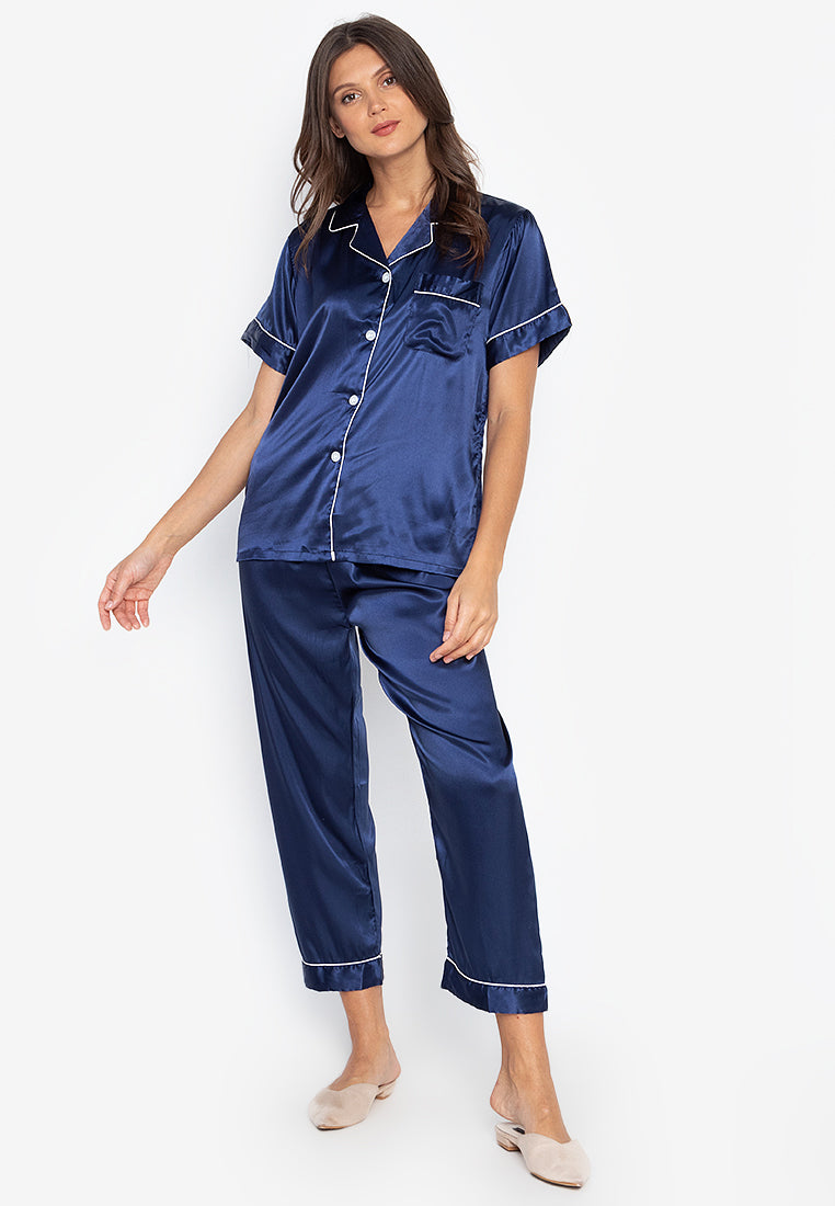 A woman wearing a Silk short sleeves Pajama Set