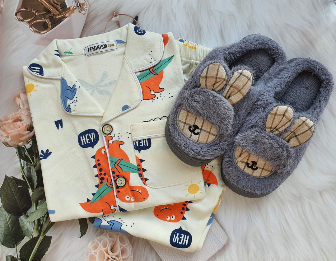 folded pajama set with complimentary slipper